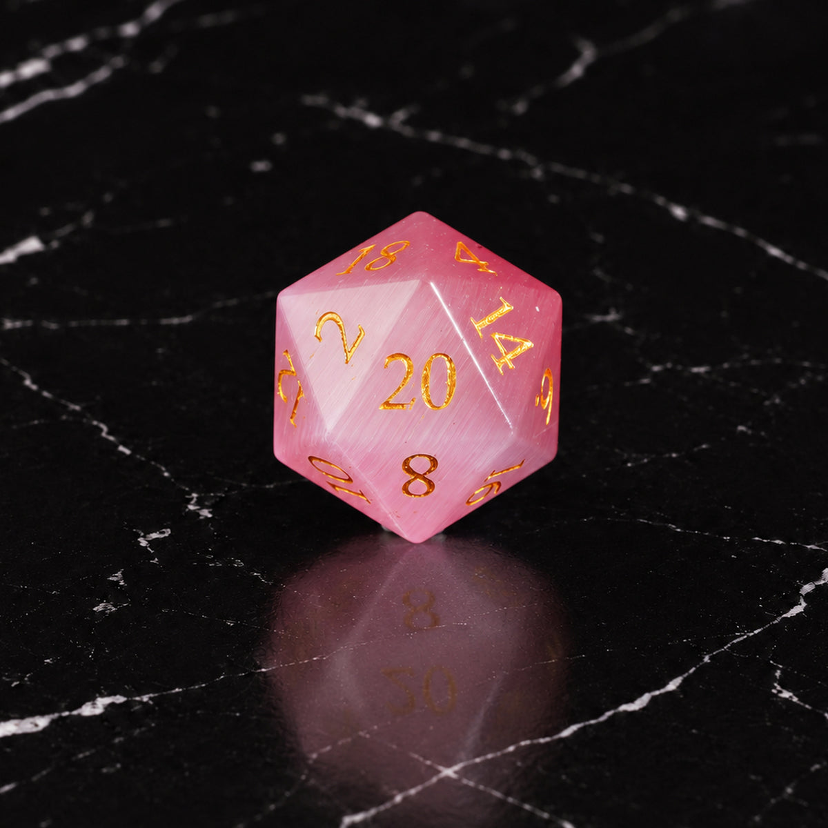 Roseveil Prophecy - D20 gemstone die on black marble