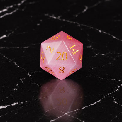 Roseveil Prophecy - D20 gemstone die on black marble