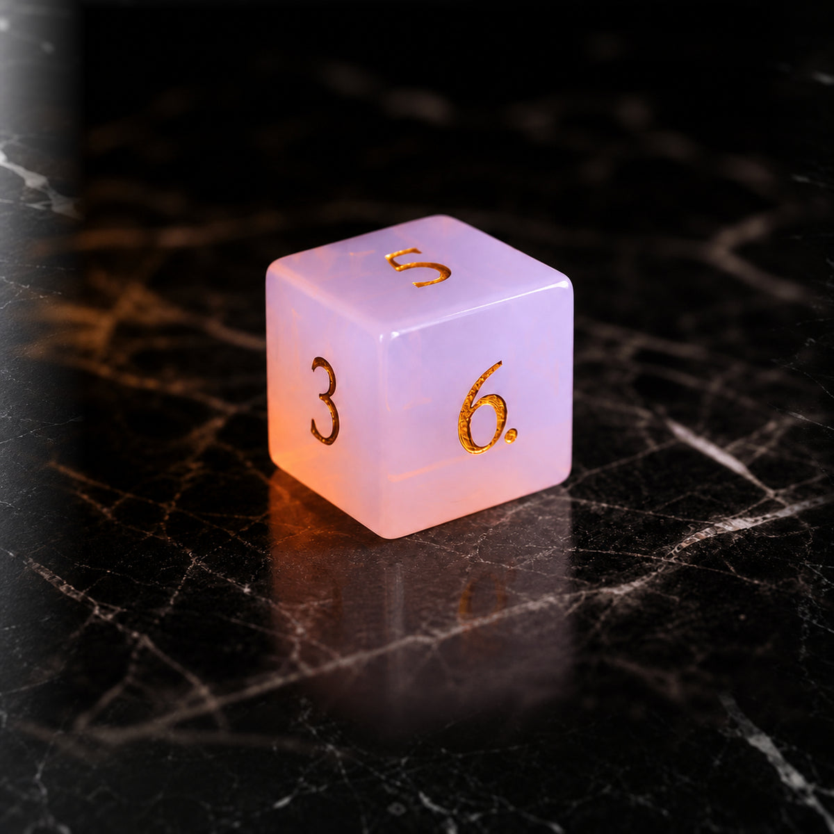 Roseveil Prophecy - D6 gemstone die on black marble