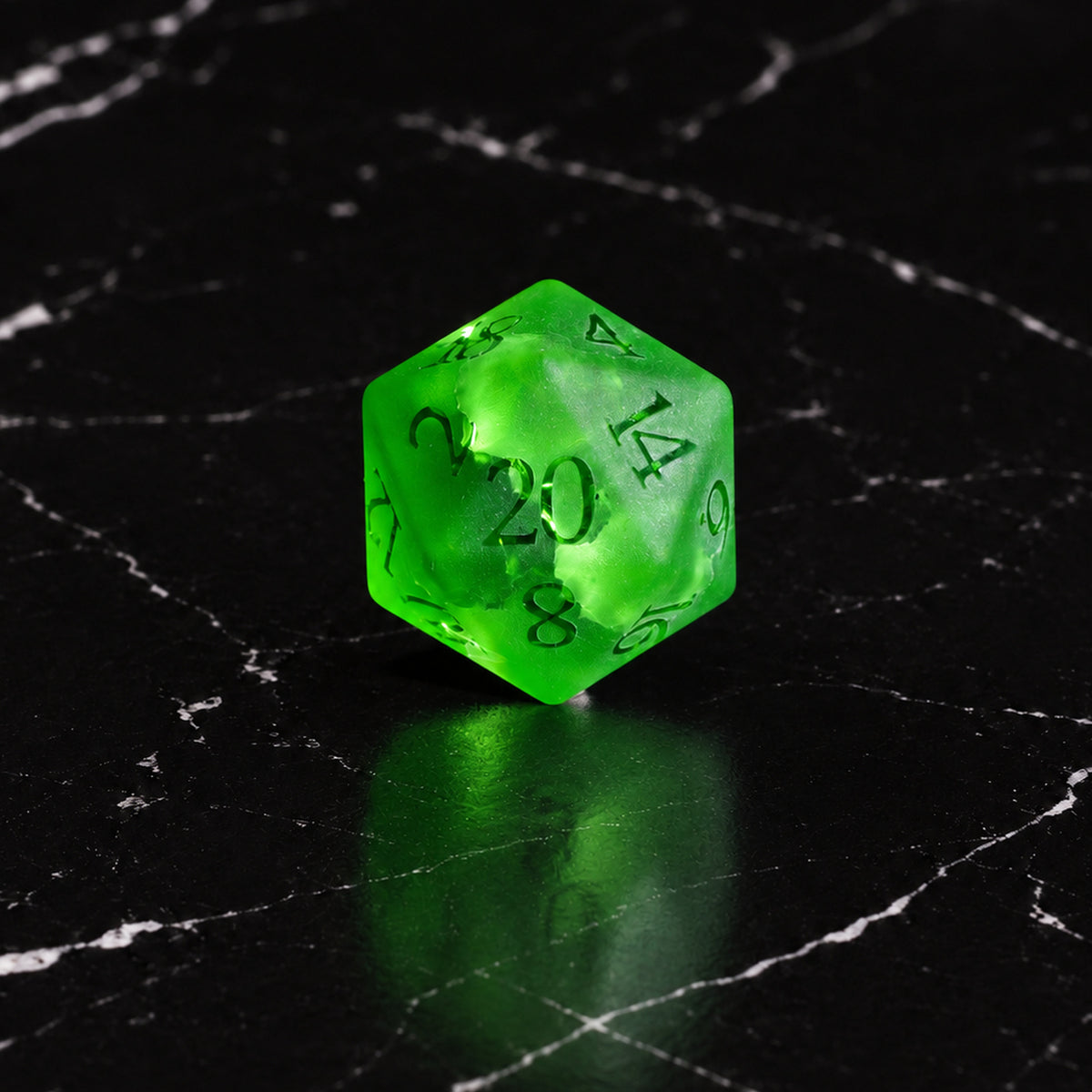 Verdant Fracture - D20 gemstone die on black marble