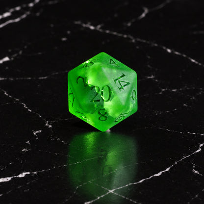 Verdant Fracture - D20 gemstone die on black marble