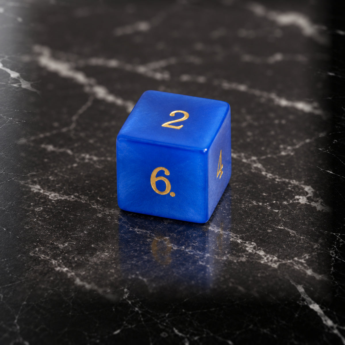 Azure Sentinel - D6 gemstone die on black marble