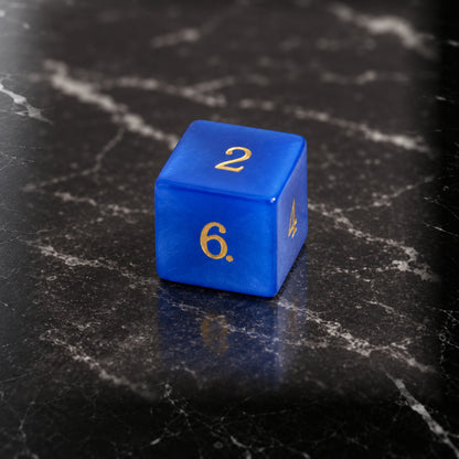 Azure Sentinel - D6 gemstone die on black marble