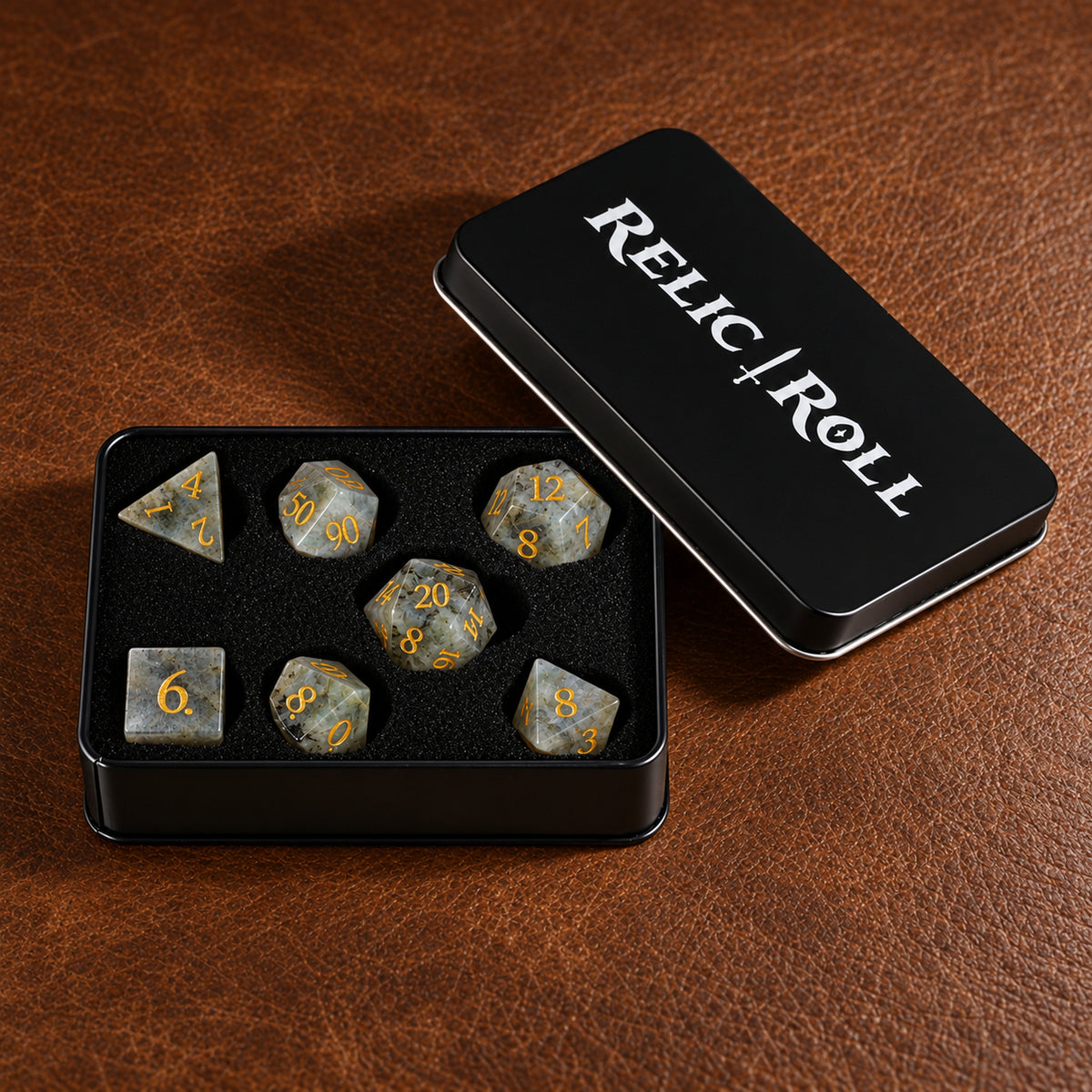 Moonlit Cairn packaging - Blue-White Gemstone DnD dice set