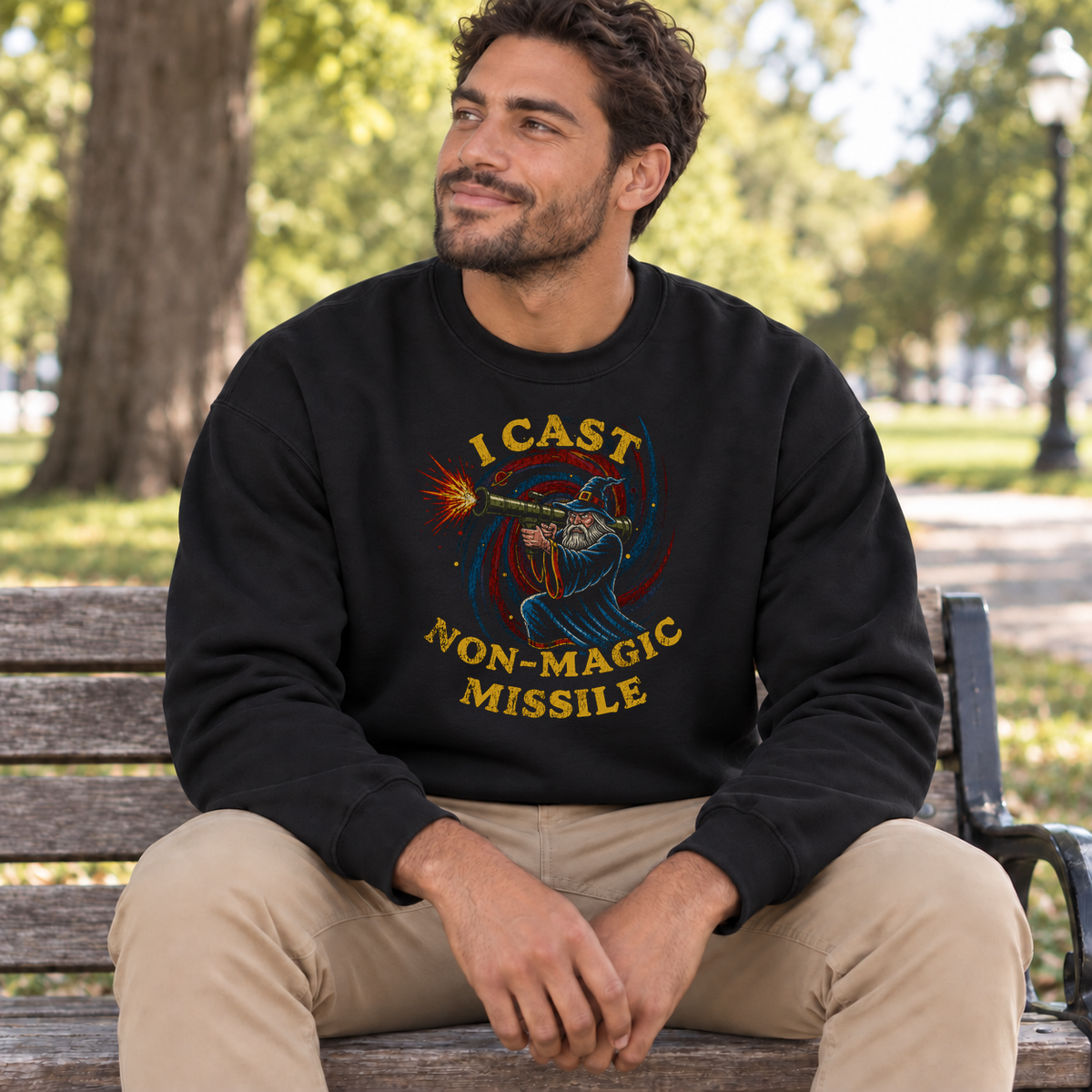 I Cast Non-Magic Missile black DnD sweatshirt worn by a man in a park