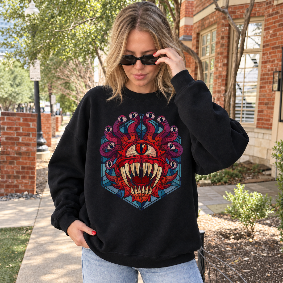 Beholder’s Gaze black DnD sweatshirt worn by a woman outdoors