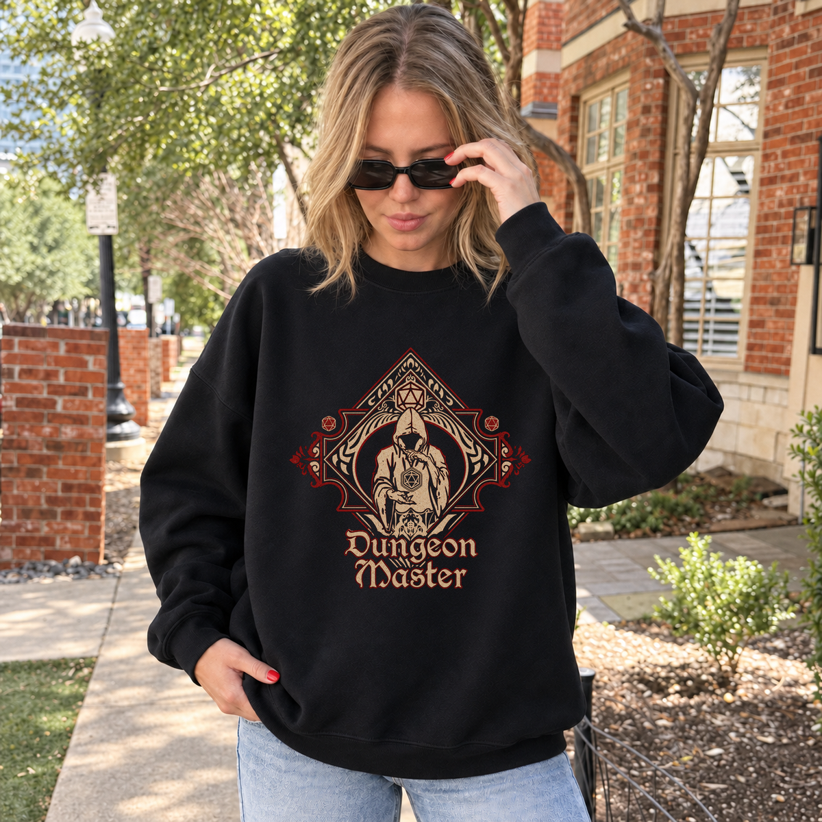 Dungeon Master black DnD sweatshirt worn by a woman outdoors