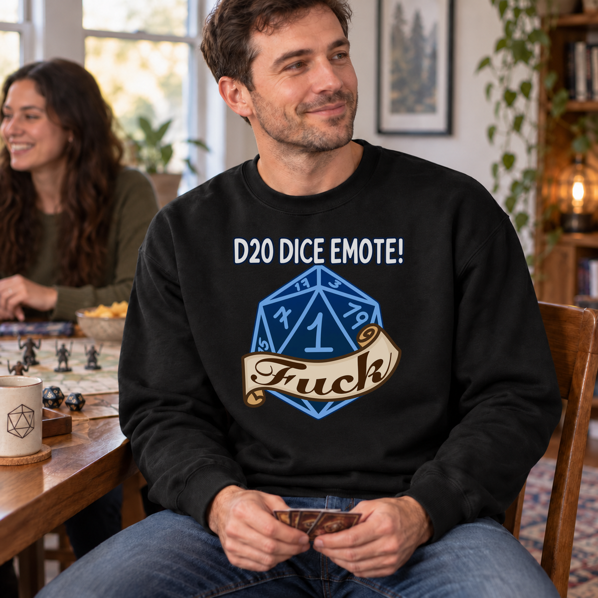 D20 Dice Emote black DnD sweatshirt worn by a man at game night