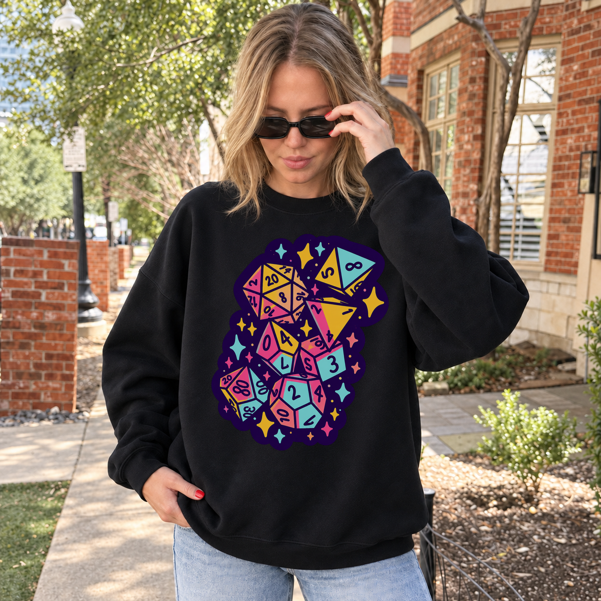 Colorful Dice Cascade black DnD sweatshirt worn by a woman outdoors