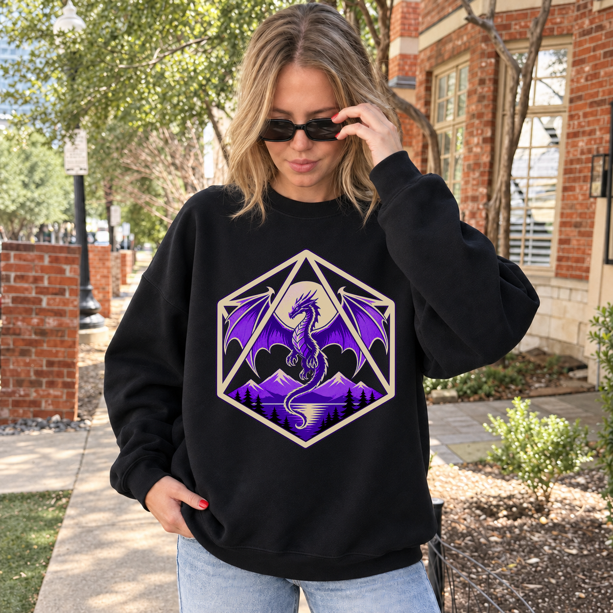 Purple Dragon D20 black DnD sweatshirt worn by a woman outdoors