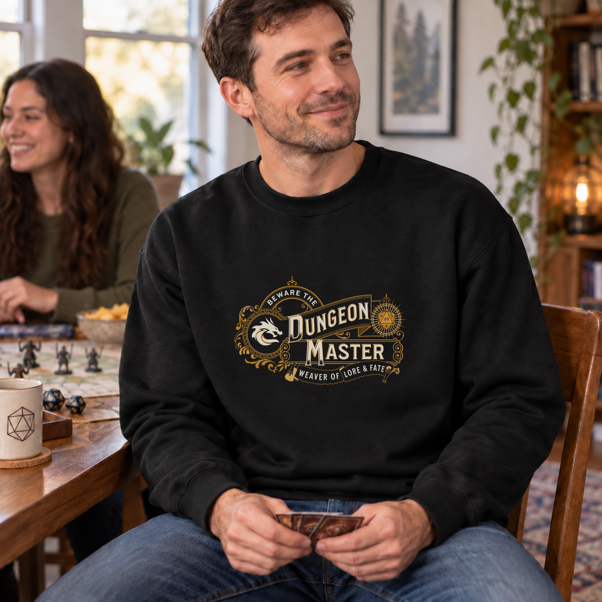 Dungeon Master Weaver of Lore & Fate black DnD sweatshirt worn by a man at game night