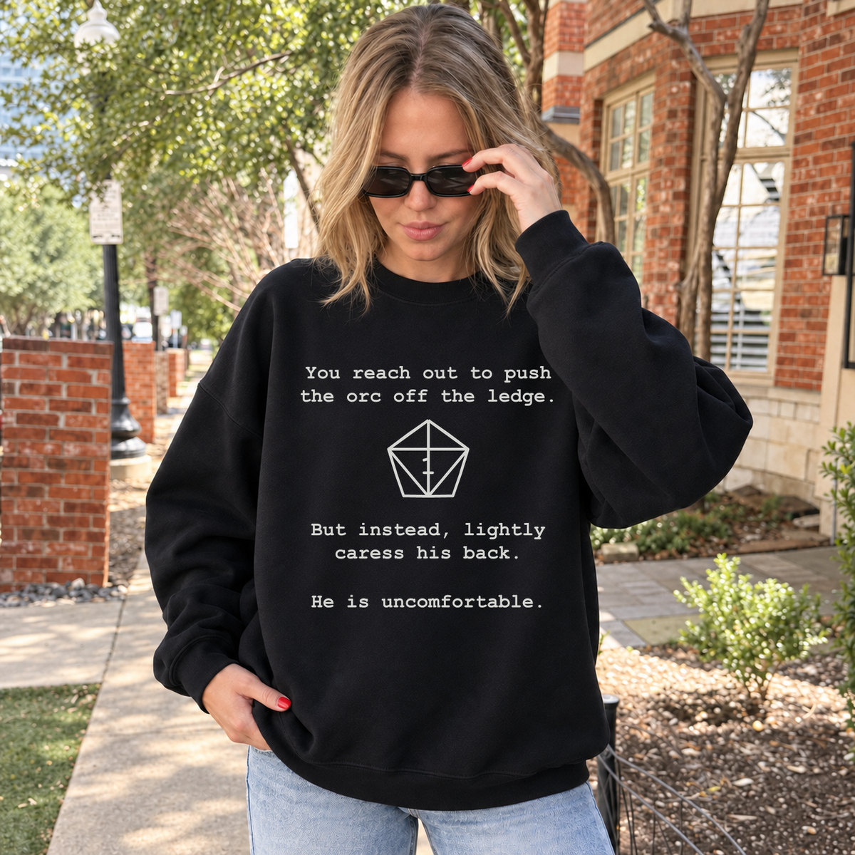 Uncomfortable Natural One black DnD sweatshirt worn by a woman outdoors