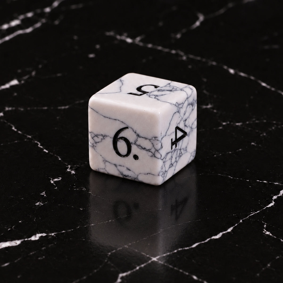 Winterweb Relic - D6 gemstone die on black marble