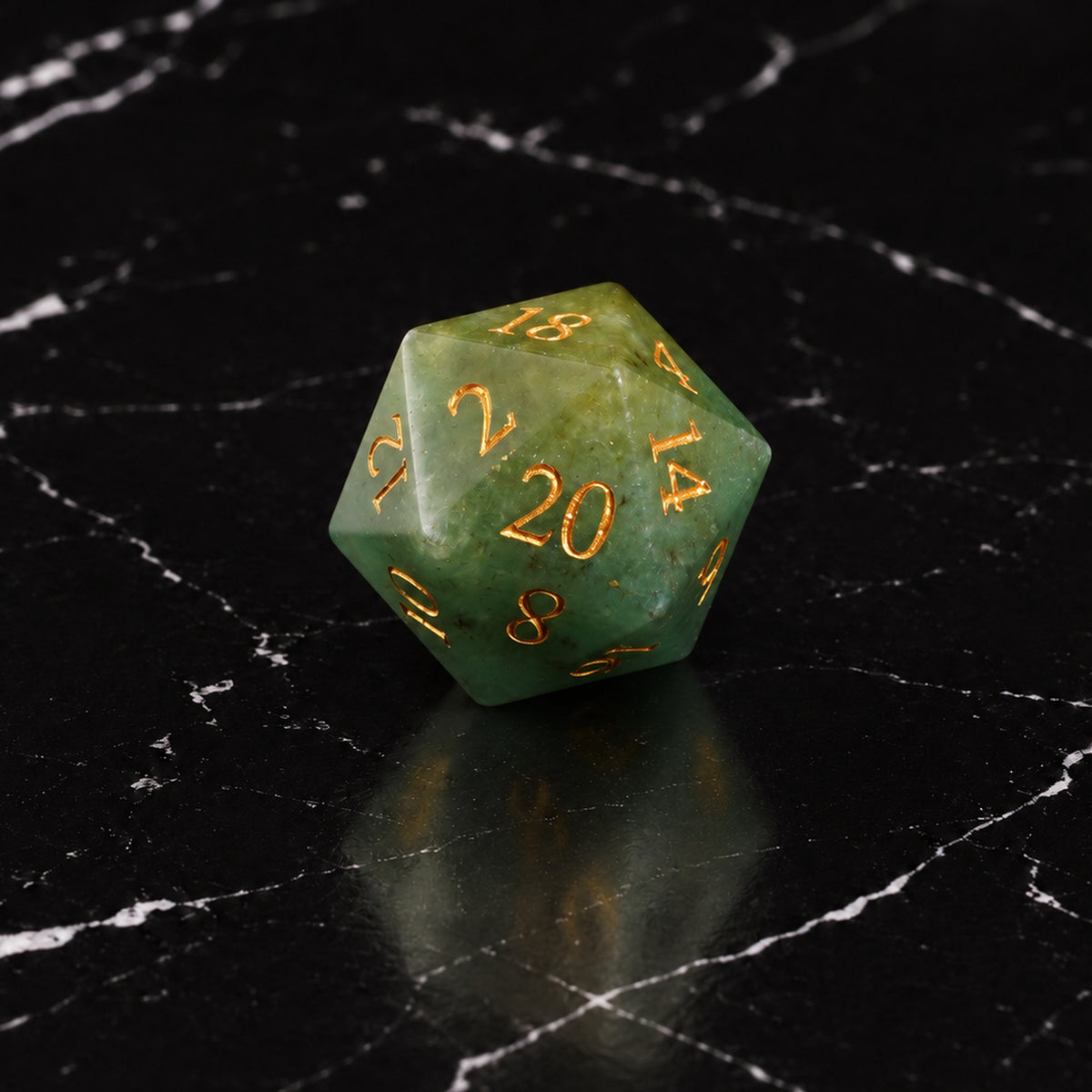 Mintlight Seer - D20 gemstone die on black marble