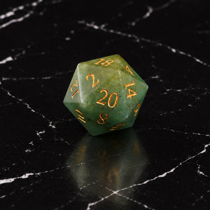 Mintlight Seer - D20 gemstone die on black marble