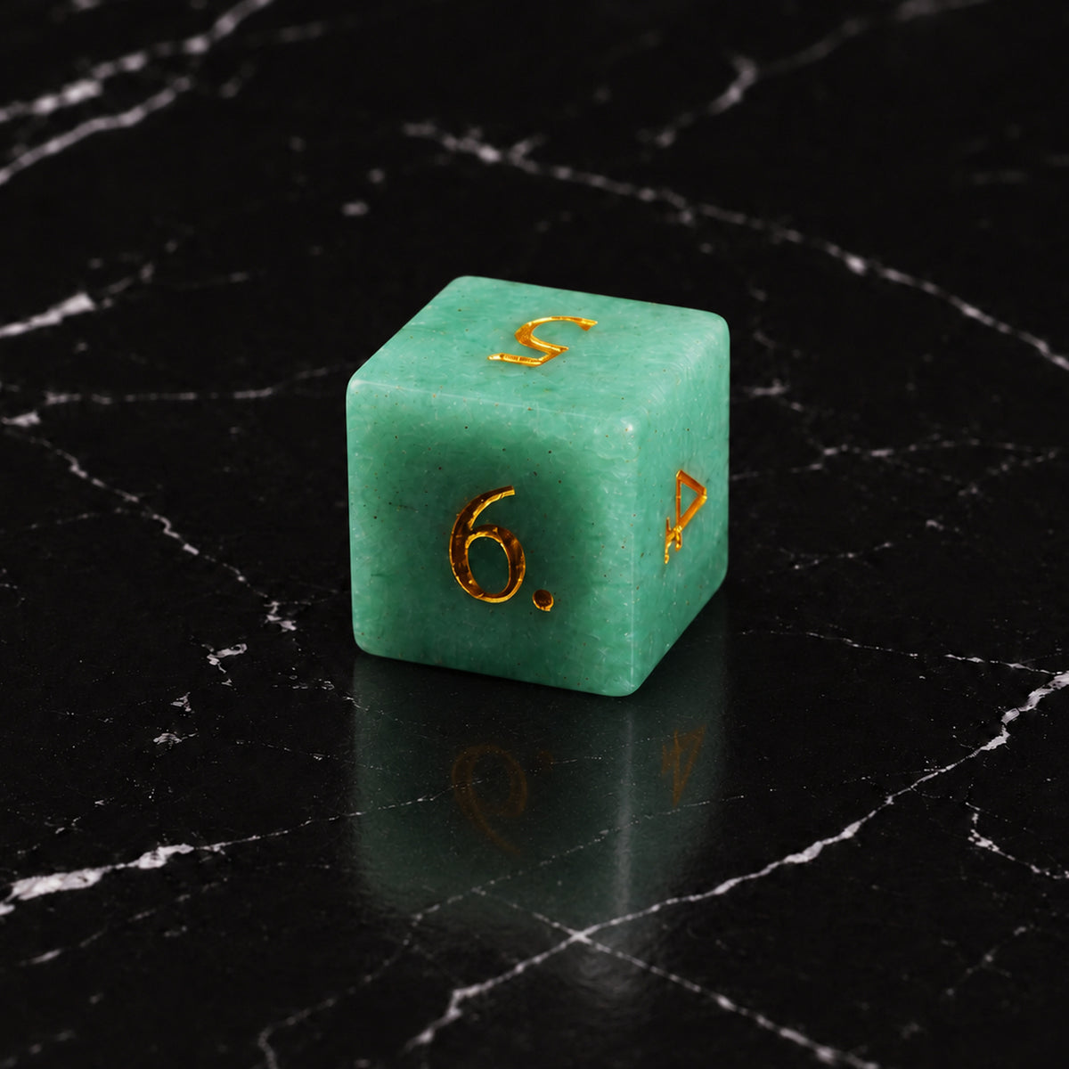 Mintlight Seer - D6 gemstone die on black marble
