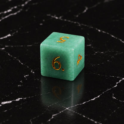 Mintlight Seer - D6 gemstone die on black marble