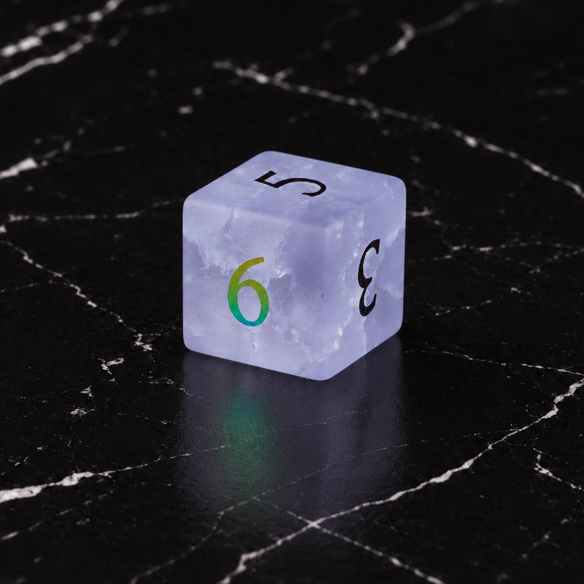 Violet Stormglass - D6 gemstone die on black marble