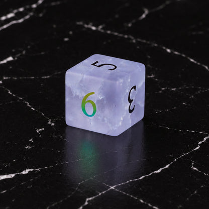 Violet Stormglass - D6 gemstone die on black marble