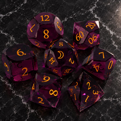 Crimson Moon Faceted Purple-Red Glass DnD dice overhead view