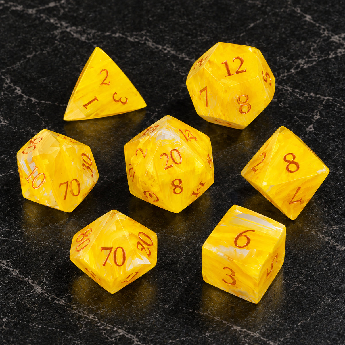 Sunforge Aurora flatlay - Yellow Aurora Brushed Gemstone DnD dice set